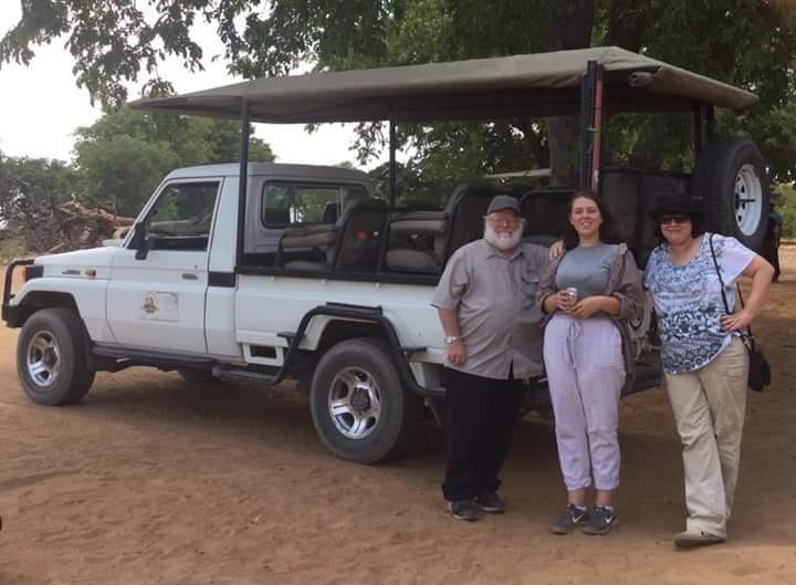 Randy, his daughter Janet and wife Karon on a safari in the Kalahari Desert, Botswana.
